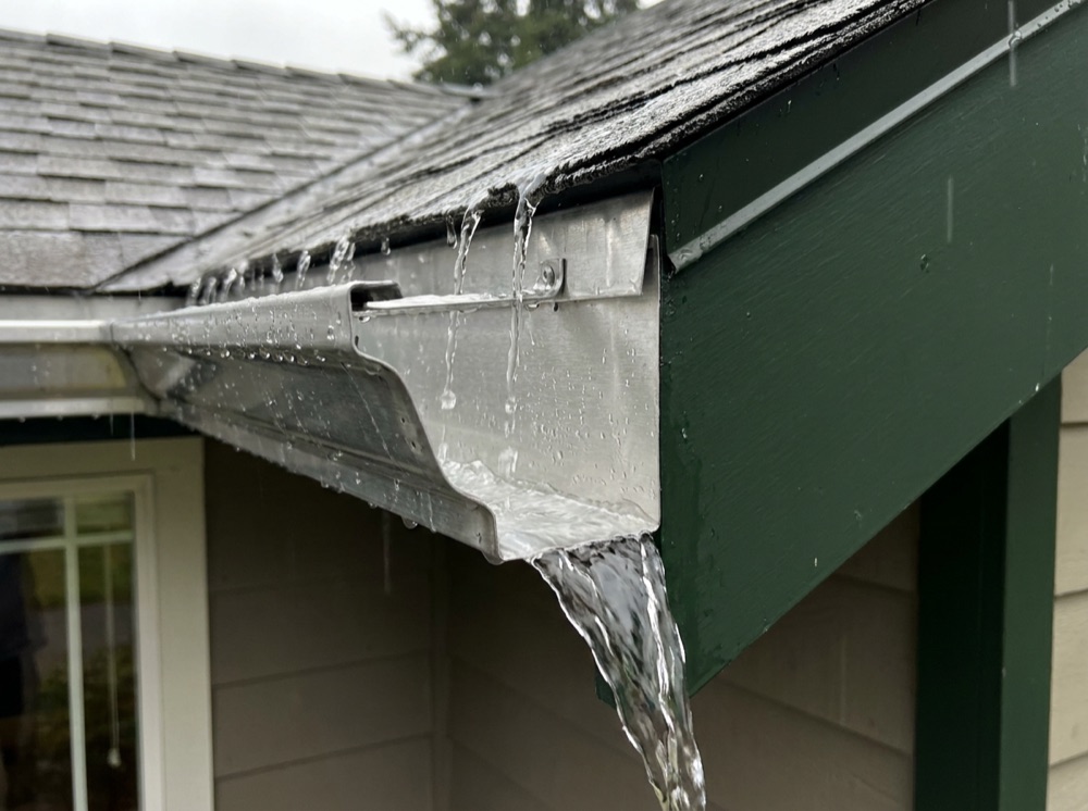 Clean free-flowing gutters and downspout after service in Tacoma
